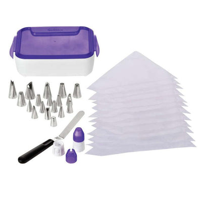 Wilton® 46 Piece Deluxe Decorating Set with offset spatula, couplers, piping tips, piping bags, and case